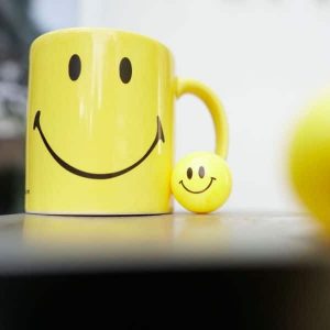 kundenorientiertes-verhalten_freundlichkeit_smiliey Kundenorientiertes Verhalten, Freundlichkeit, Smiley-Tasse